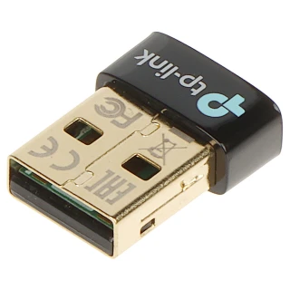 Adapter USB Bluetooth 5.0 TP-Link TL-UB500 ma kompaktowy, złoty wtyk z czarną obudową z logo TP-Link. Jest przeznaczony do bezprzewodowego łączenia urządzeń z komputerem.