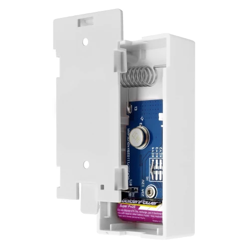 Otwarta obudowa białego bezprzewodowego systemu alarmowego z widocznymi elementami elektronicznymi i baterią. Wnętrze urządzenia zawiera płytkę drukowaną z komponentami oraz sprężynowy uchwyt na baterię.