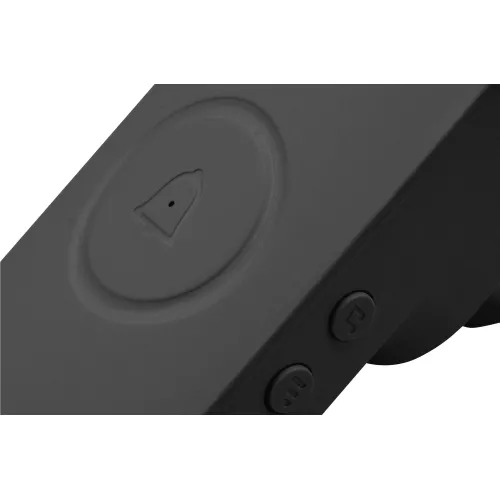 Czarny, kinetyczny dzwonek bezprzewodowy z widocznym symbolem dzwonka na przycisku. Obok znajdują się dwa okrągłe przyciski funkcyjne.