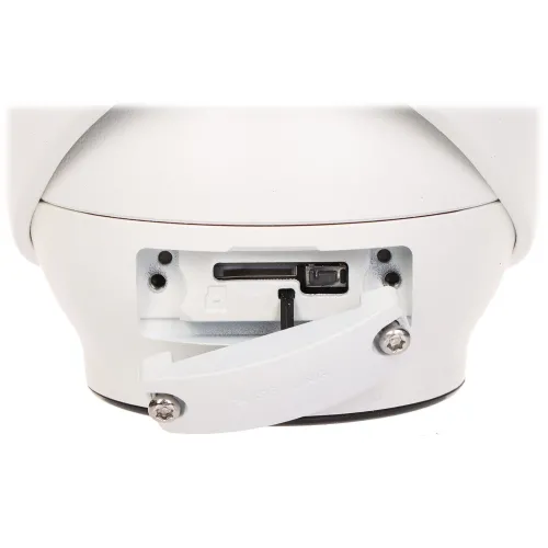 Zdjęcie przedstawia białą kamerę monitoringu z otwartą klapką, ukazującą gniazdo na kartę pamięci oraz przycisk reset. Klapka jest przymocowana dwoma śrubami i ma napis "SETTING".