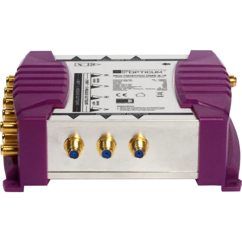 Multiswitch Opticum OMS to urządzenie z fioletowymi elementami obudowy i złotymi złączami. Produkt Multiswitch Opticum OMS służy do dystrybucji sygnału satelitarnego.