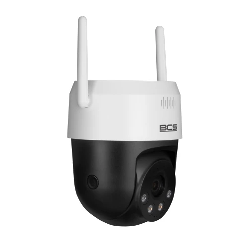 Obraz przedstawia obrotową kamerę Wi-Fi o rozdzielczości 5 MPX z dwoma antenami, w kolorze czarno-białym. Kamera posiada logo BCS i jest wyposażona w kilka diod LED wokół obiektywu.