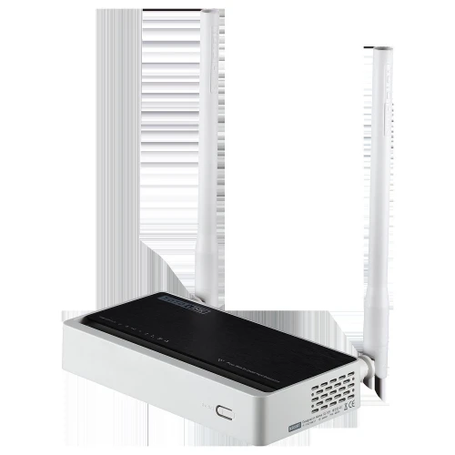 Na zdjęciu znajduje się biały router z dwoma pionowymi antenami i czarnym panelem górnym. Urządzenie ma prostokątny kształt i widoczne są otwory wentylacyjne po bokach.