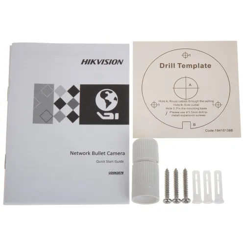 Na zdjęciu znajduje się zestaw akcesoriów do montażu kamery sieciowej, w tym instrukcja obsługi, szablon do wiercenia, śruby montażowe i kołki. Elementy są ułożone na białym tle, a instrukcja ma logo Hikvision.