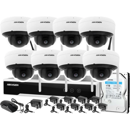 Na zdjęciu znajduje się zestaw monitoringu bezprzewodowego Hikvision z 8 kamerami WiFi 4Mpx oraz dyskiem 1TB. Komponenty zestawu są rozmieszczone na białym tle, prezentując kamery i rejestrator.